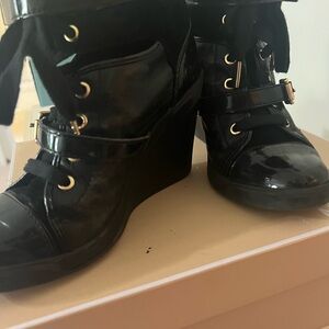 Michael Kors leather wedge boot. size 8 fits 7.5 lace up bootie with gold buckle